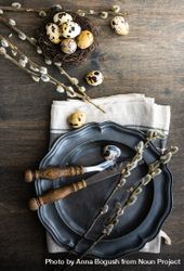 Top View Of Easter Table Setting With Quail Eggs In Nest And Pussy