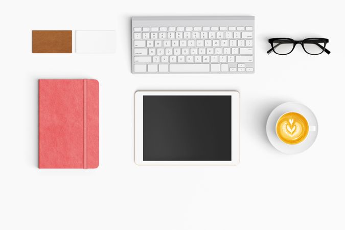 Modern workspace with coffee cup, smartphone, paper, notebook and tablet copy space