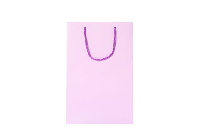 Purple paper bag isolated on blank background