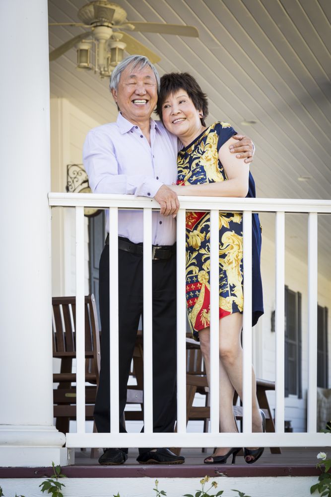 Chinese Couple Enjoying Their House