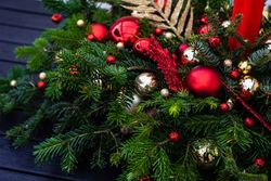 Christmas festive center piece with fir and gold & red ornaments
