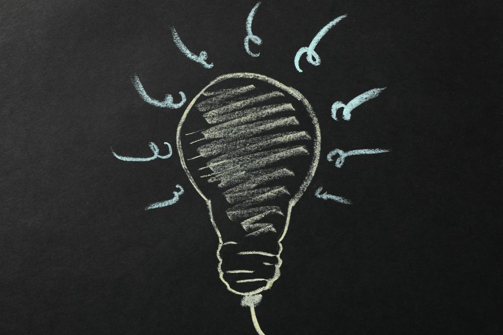 Chalk bulb on dark background. Good idea concept