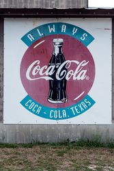 Old Coca-Cola sign on a building in Pipe Creek, a small community in Bandera County, Texas 65X7Q0
