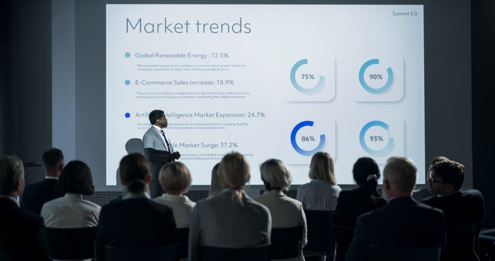Corporate Event: Black Male Tech CEO Giving Presentation To Colleagues or Investors In Conference Room Of Innovative Startup Office.