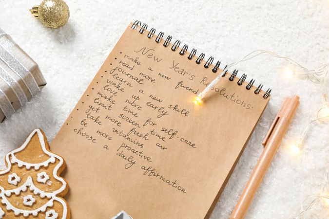 Concept of New Year Resolutions list, new year goals, close up