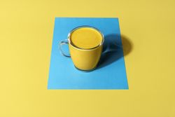 Turmeric latte in sunlight