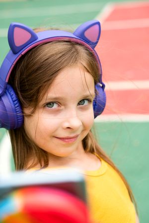 School girl with headphones