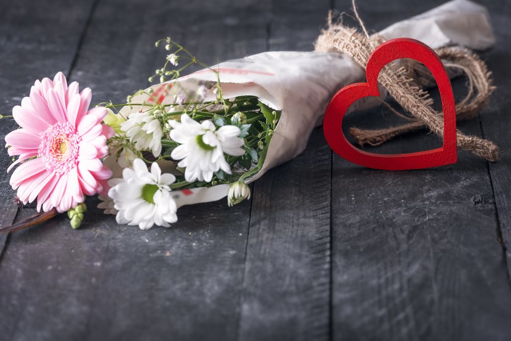 Bouquet of flowers and a red heart