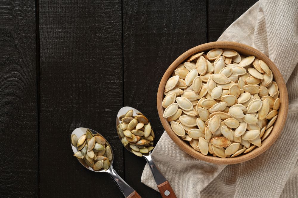 Concept of Autumn vibe food, Pumpkin, Pumpkin seeds, space for text