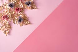Layout made with pastel pink and purple flowers and gold leaves