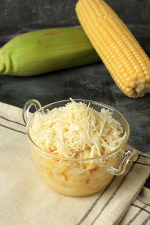 Steamed Corn with Sweet Condensed Milk and Shredded Cheese Topping.
