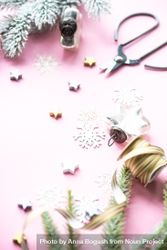 Christmas decorations of snowflakes and stars on pink background 4m87B5