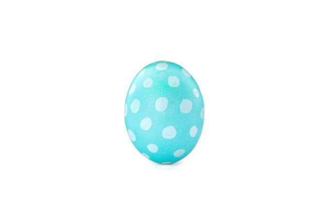 Decorative Easter egg isolated on light background. Festive tradition