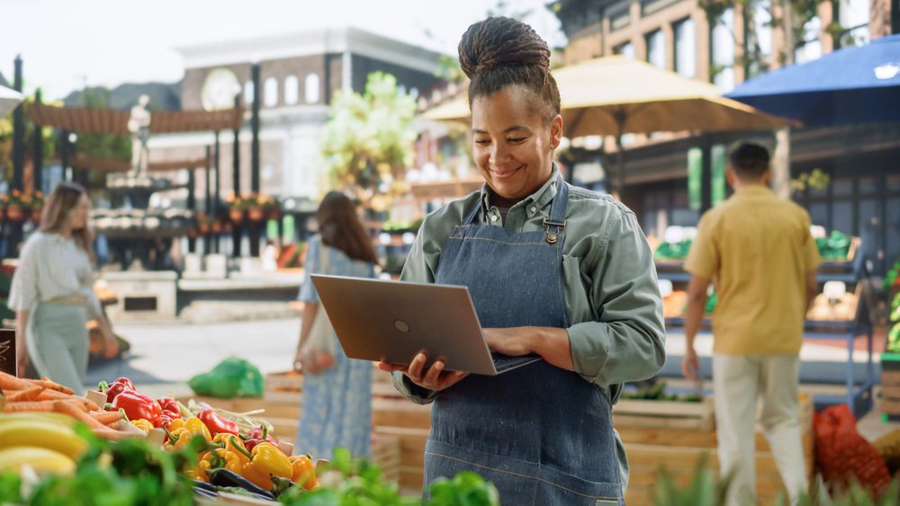 Black Female Managing Business Operations and Communications with Suppliers