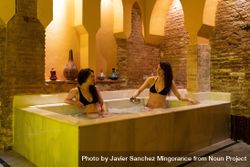 Friends bathing together in Arabic bathhouse beQWpb