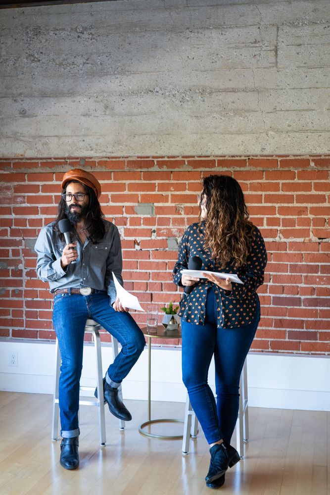 Man and woman giving a talk