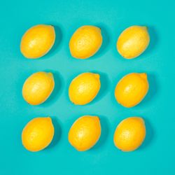 Lemons on bright blue background