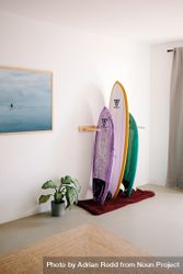 Surfboards propped up in rack 5kyyLb