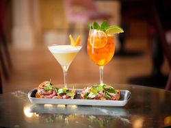 Delicious appetizers and aperitif cocktails