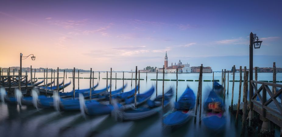 Venice lagoon, San Giorgio church and gondolas at sunrise, Italy