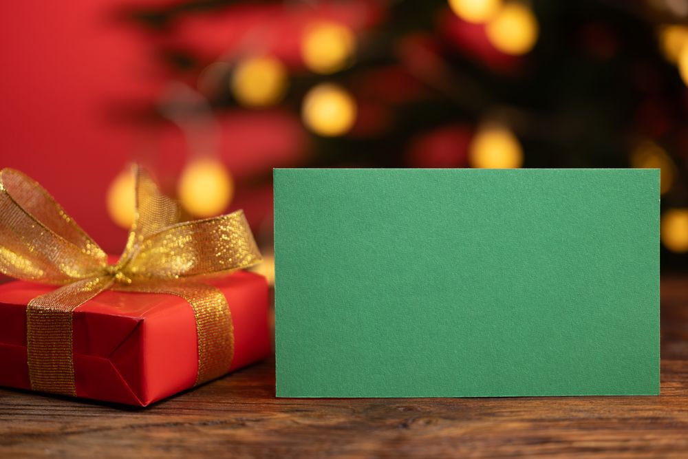 Christmas greeting card mockup with gifts