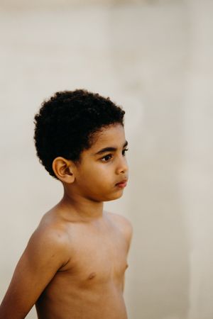 Funny Black boy on beach