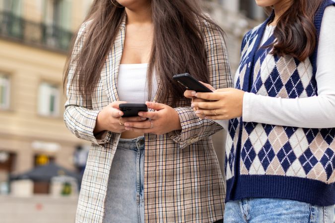Young Asian women using smartphone in the city