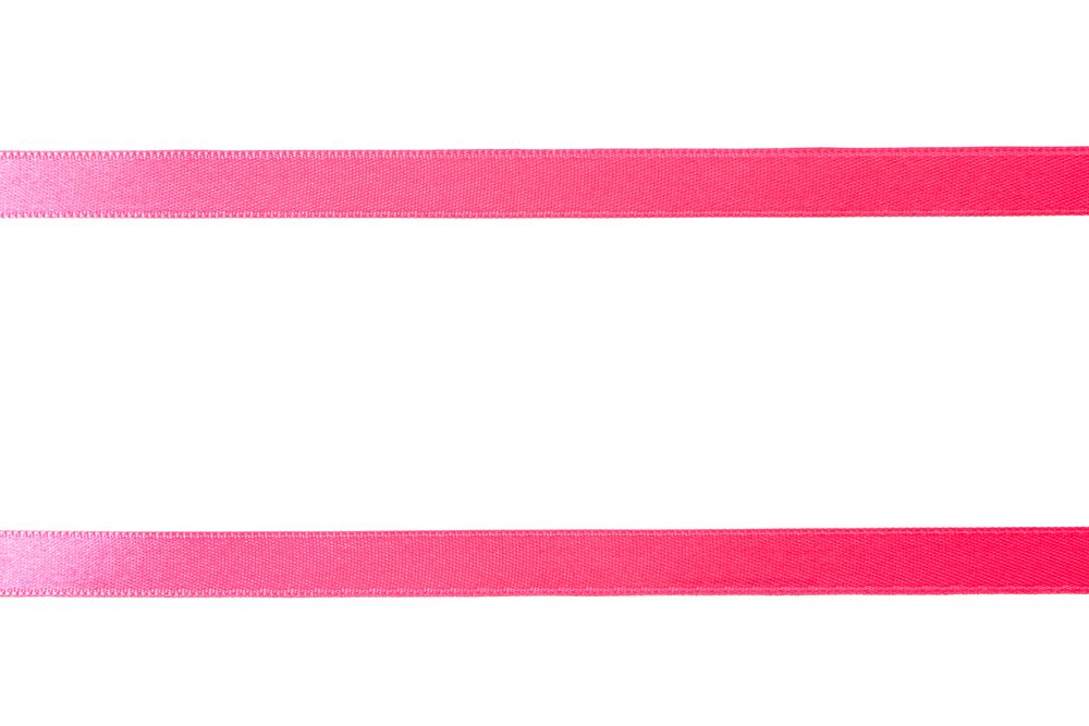 Pink ribbons isolated on plain background. Gift concept
