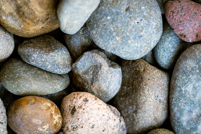A pile of rocks with a variety of colors and sizes