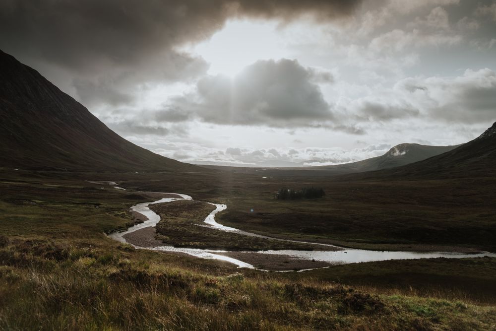 Valley covered with water patches surrounded by hills