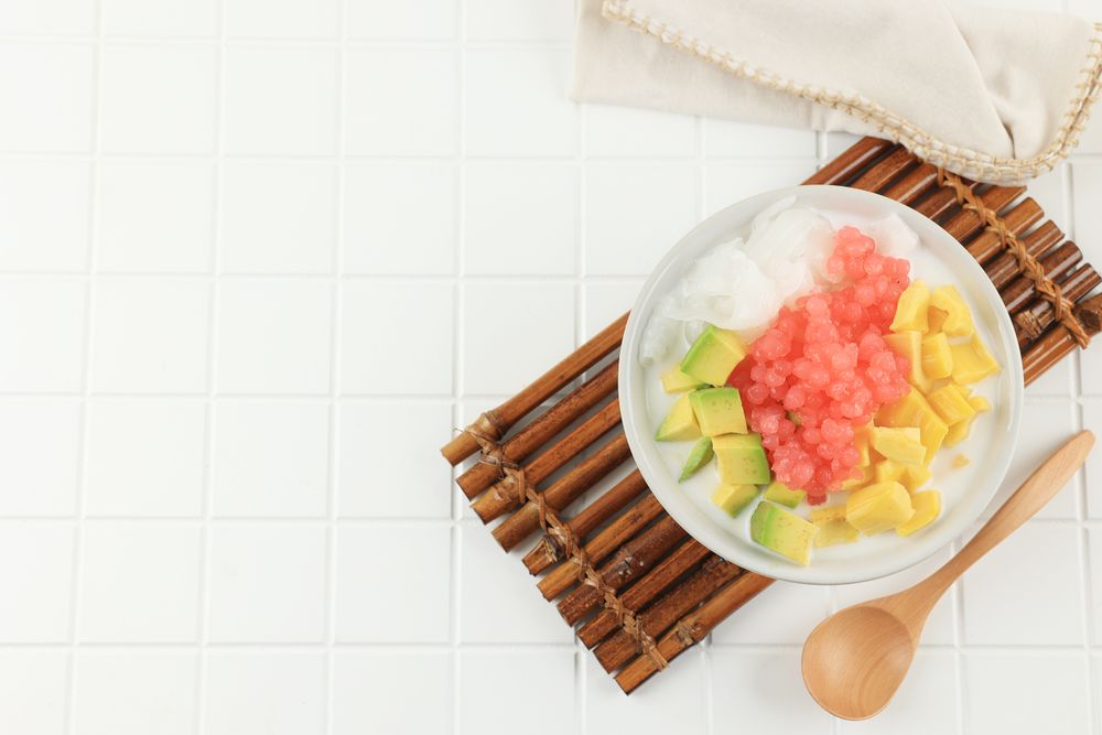 Top View Es Campur or Es Oyen is Mix Fruit with Shaved Ice Served on a Bowl