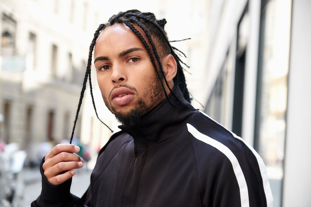 Black male standing on the street