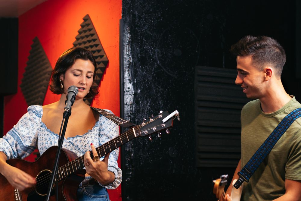 Music group rehearsing in a music venue