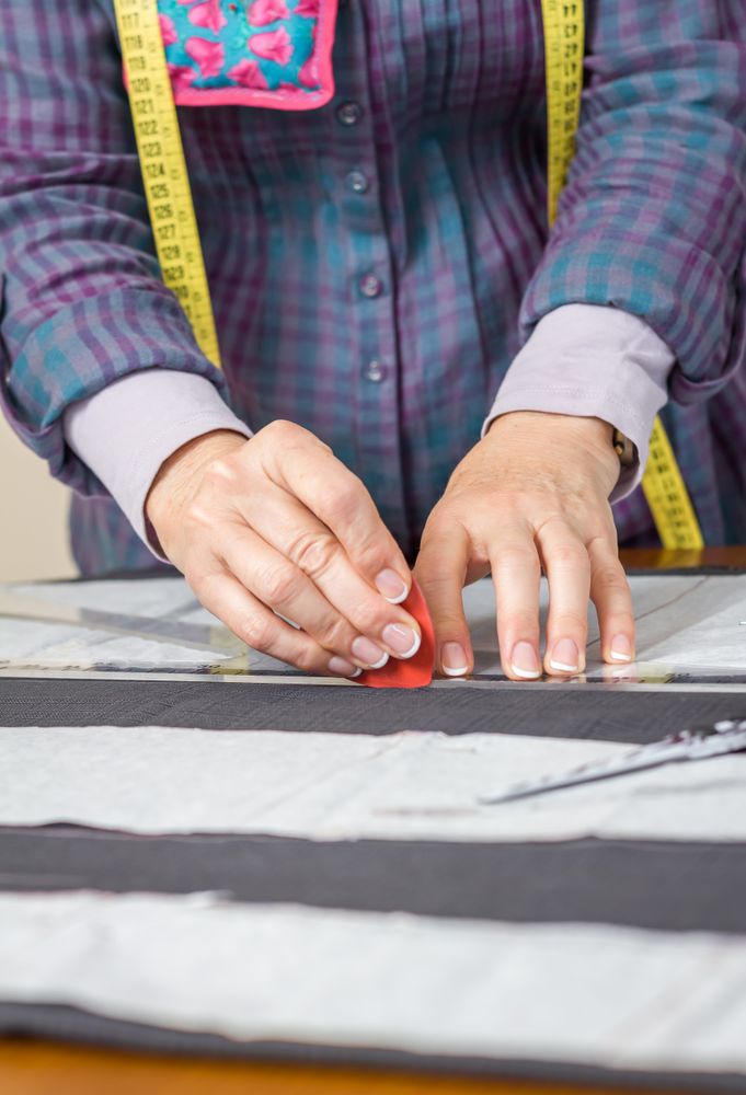 Dressmaker design tailor pattern on the table