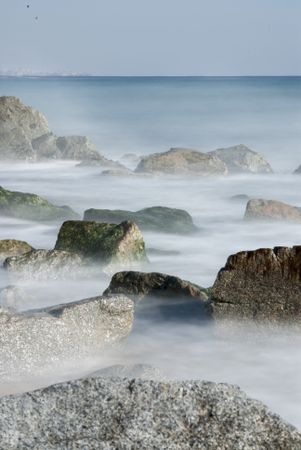 Rocks in the seashore with a long exposure and silky water