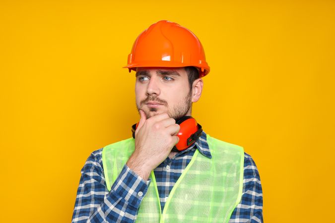 Young man civil engineer in safety hat