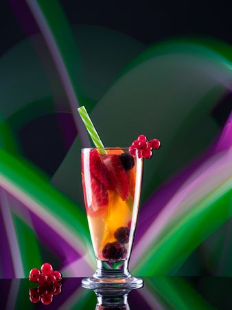 Glass with drink and berries