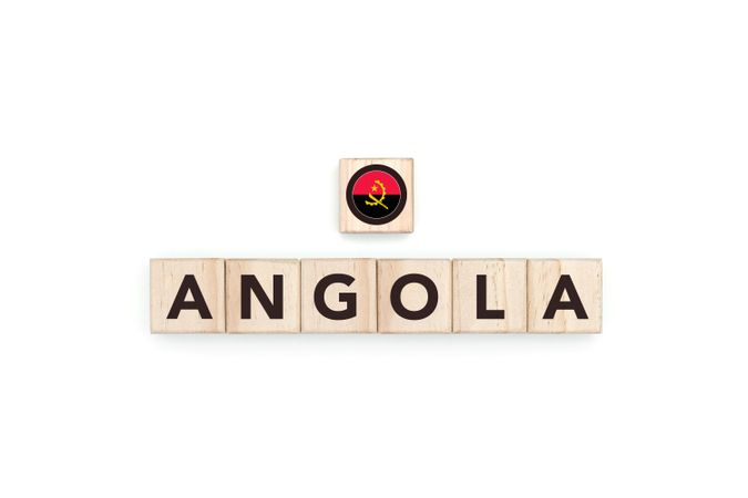 Wooden blocks bearing the name and flag of Angola.