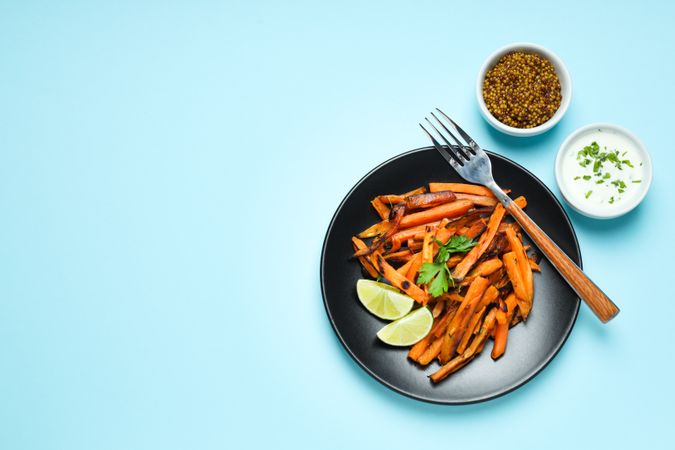 Concept of tasty food - sweet potato fries