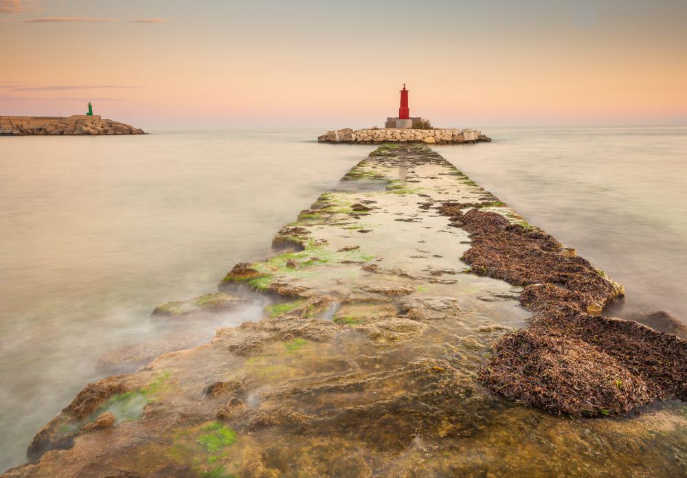 Rough path to islet with lighthouse