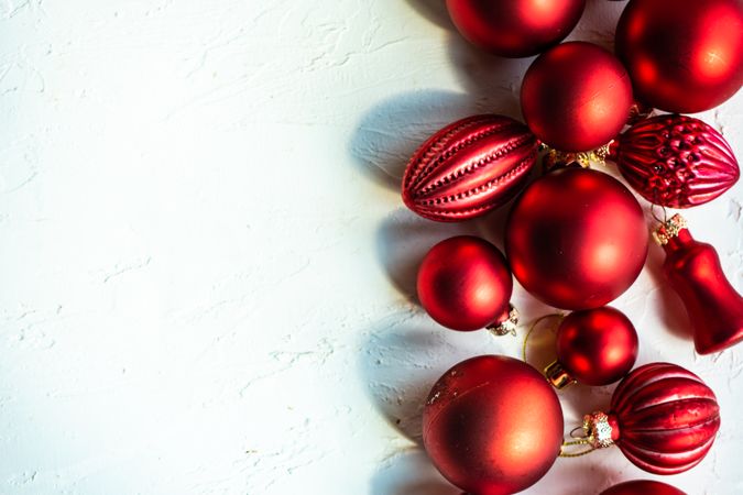 Christmas red baubles in line at right side of picture