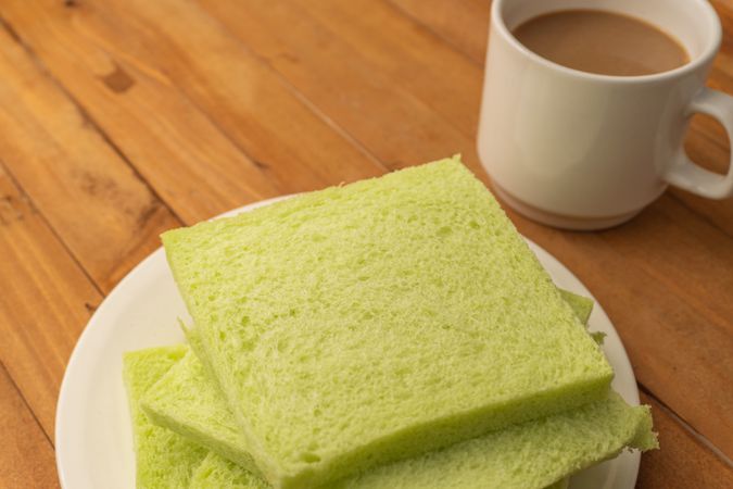Soft pandan flavored bread and milk coffee