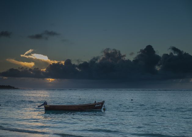 Simple boat at sunset in the Indian Ocean