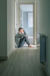 Man sitting on the floor