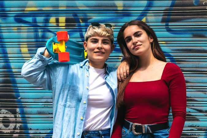 two women with a skate portrait