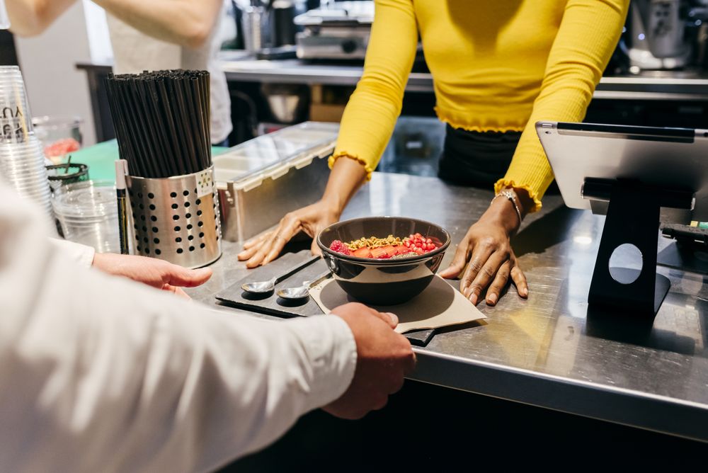 Woman receiving lunch order