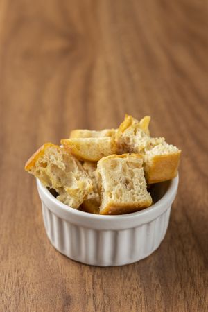 Delicious crunchy croutons on the table.