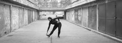 Woman touching her toes and stretching pre-workout