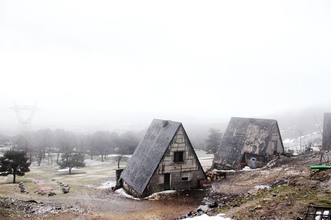 Grungy houses on foggy day
