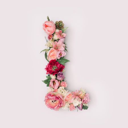 Letter L made of real natural flowers and leaves